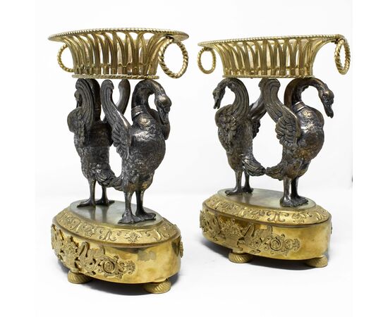 Pair of centerpieces with swans