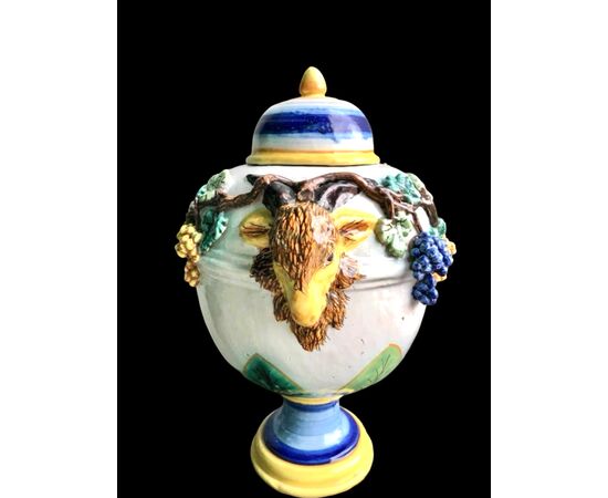 Pair of majolica vases with raised grape vine decoration and leaf motif. Rubbiani manufacture, Sassuolo.