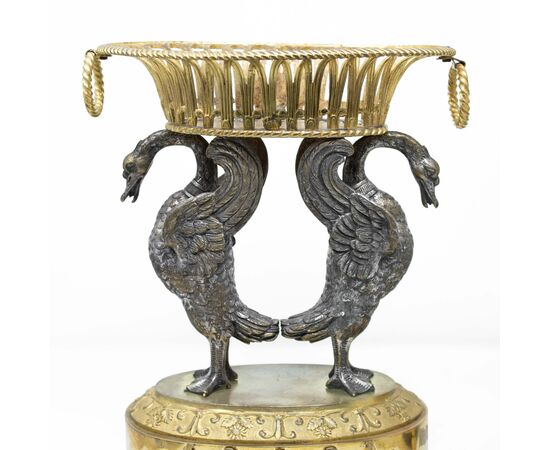 Pair of centerpieces with swans