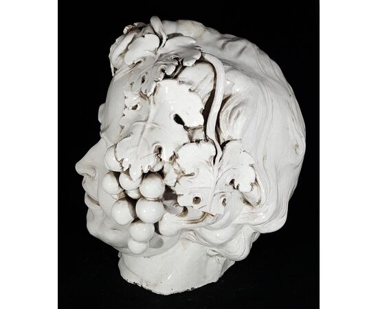 Head of Bacchus in white glazed terracotta