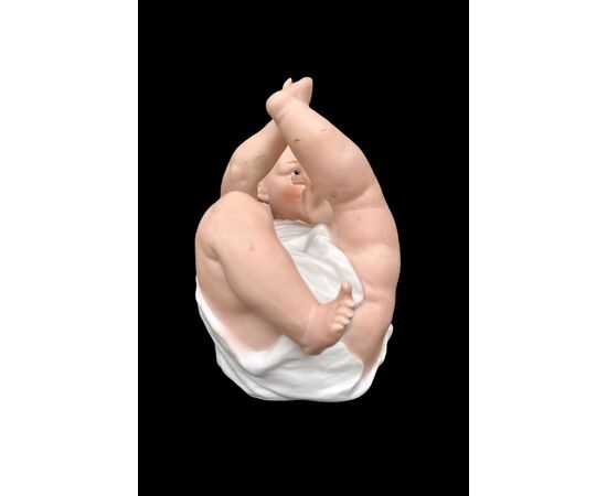 Bimbo in porcellana bisquit policroma.Manifattura Heuback.Germania.
