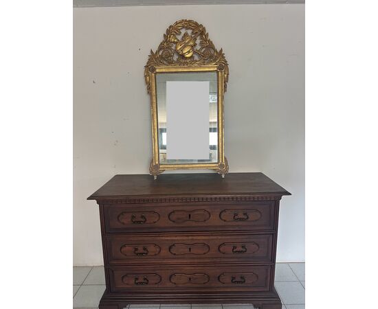 Specchiera in legno intagliato e dorato a foglia. Toscana epoca impero prima metà 800