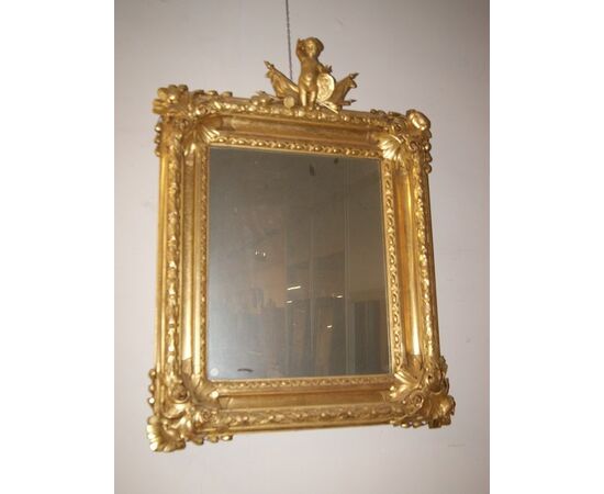 Stupenda specchiera francese dorata con putto di inizio 1800 foglia oro