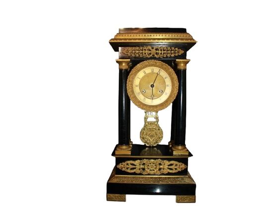 Orologio francese stile Impero del 1800 in legno ebanizzato con bronzi