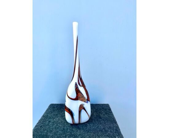 Milky blown glass vase with triangular section polychrome inclusions.Murano.     