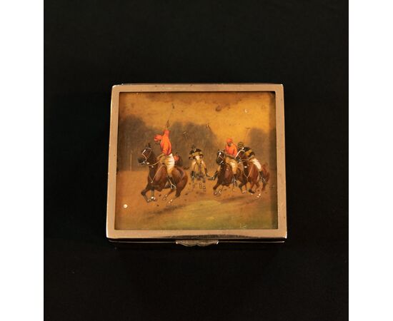 Cigarette box with polo game     