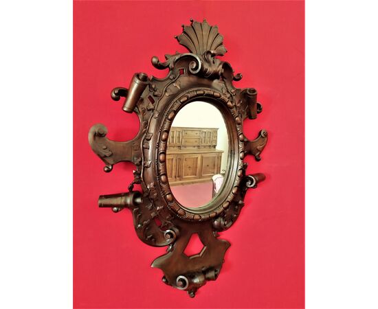 Specchio in legno intagliato