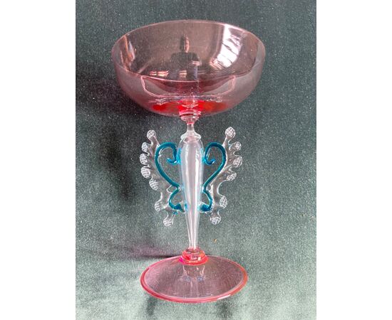 Cup in iridescent glass and worked with the pliers.Manifattura Fratelli Toso.Murano.     