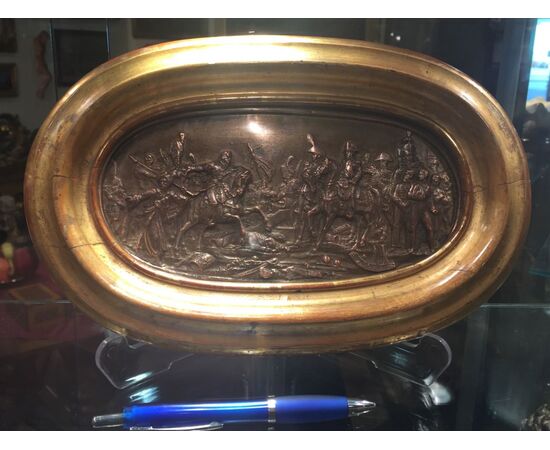 Oval copper plaque depicting the Napoleonic battle of Austerlitz with a contemporary 19th-century frame.