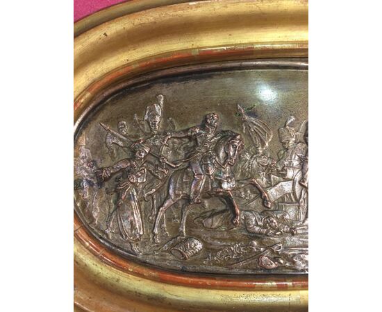 Oval copper plaque depicting the Napoleonic battle of Austerlitz with a contemporary 19th-century frame.