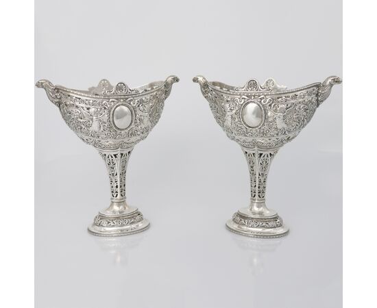 Pair of pierced, embossed and chased silver cups, Hanau, late 19th century