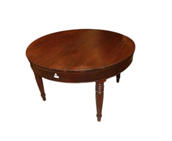 Large round extendable walnut table from the early 1800s