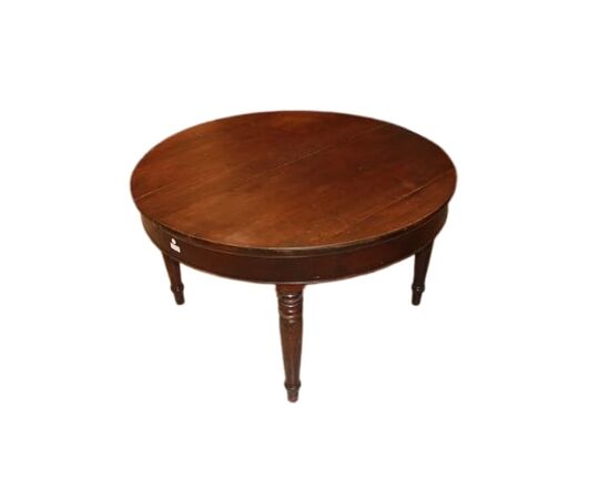 Large round extendable walnut table from the early 1800s