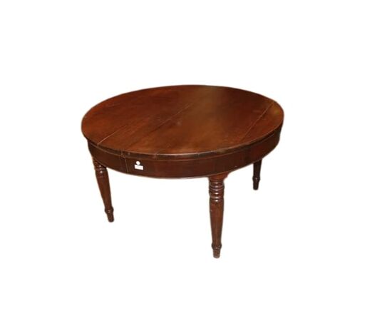 Large round extendable walnut table from the early 1800s