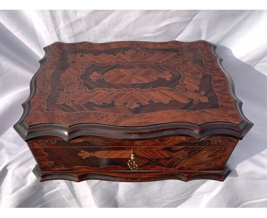 Carved and veneered wooden box. Italy, early 20th century.
