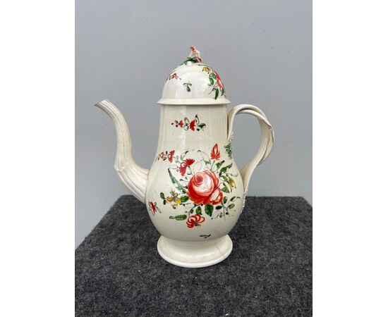Rose decorated earthenware coffee pot Derbyshire, England.     