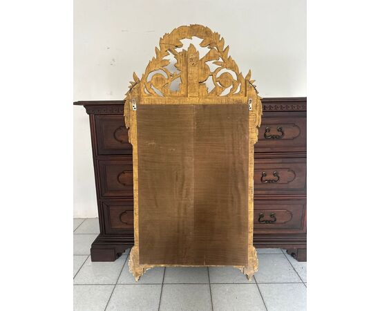 Carved and gilded wooden mirror, Tuscan Empire period, first half of the 19th century