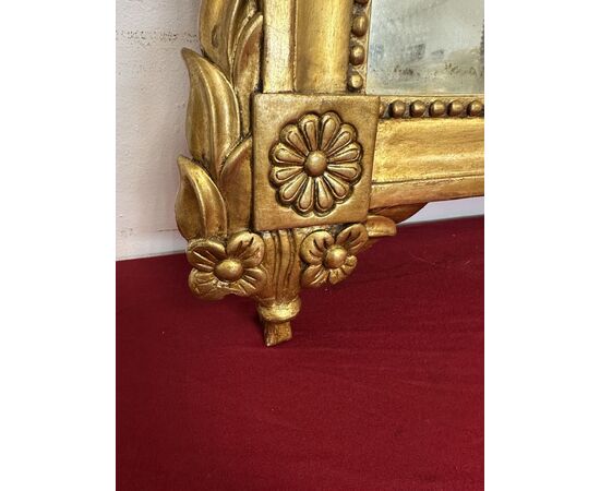 Carved and gilded wooden mirror, Tuscan Empire period, first half of the 19th century