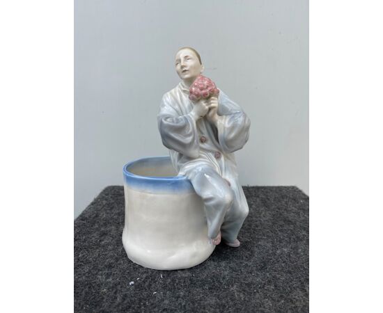 Vase with the figure of Pierrot in polychrome porcelain.Germany.     