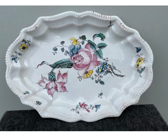 Majolica plate decorated with rose on the third fire.Manufactured by Giacomo Boselli.Savona.     