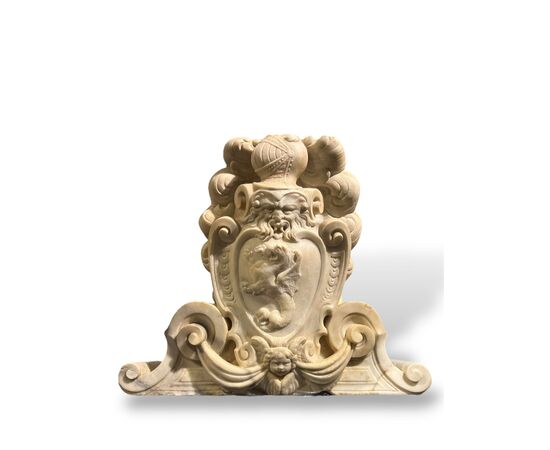 Large heraldic coat of arms carved in marble