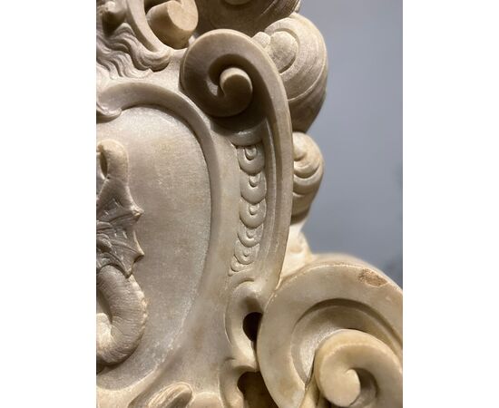 Large heraldic coat of arms carved in marble