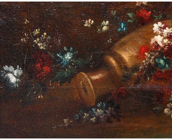 Still life with flowers, pottery and architecture in the background