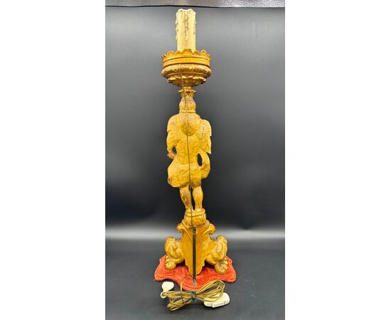 Carved and gilded wooden candlestick with cherub figure - 18th century.