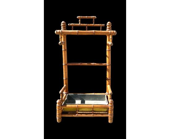 Walnut wood umbrella-cane stand imitating bamboo.