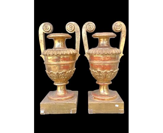 Pair of carved and gilded wooden palm holders. Genoa.