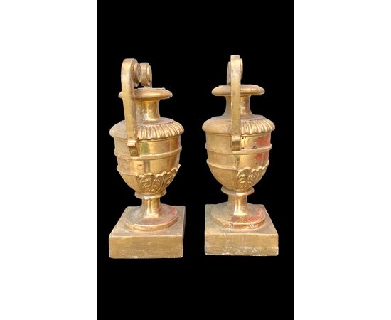 Pair of carved and gilded wooden palm holders. Genoa.