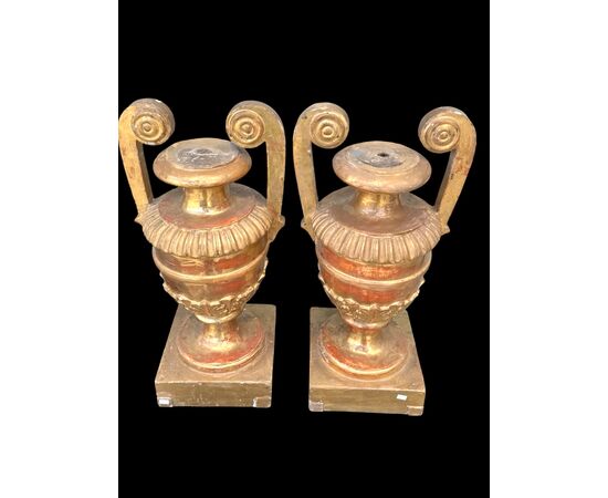 Pair of carved and gilded wooden palm holders. Genoa.
