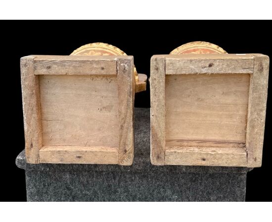 Pair of carved and gilded wooden palm holders. Genoa.