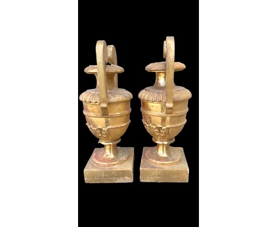 Pair of carved and gilded wooden palm holders. Genoa.