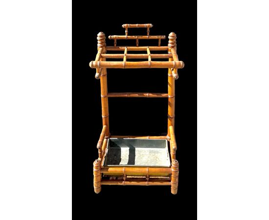 Walnut wood umbrella-cane stand imitating bamboo.