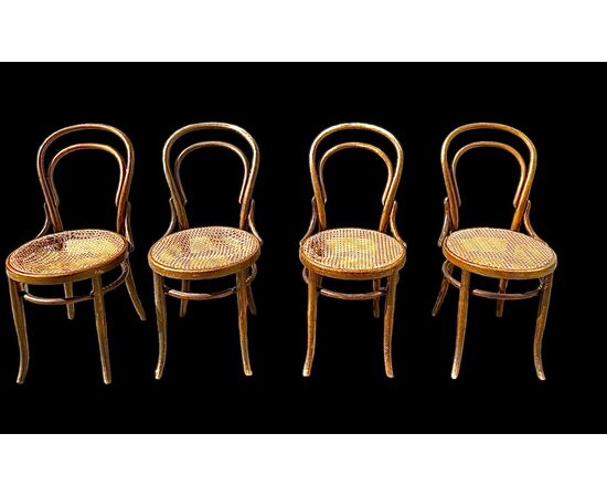 4 wooden chairs with Vienna straw seats. Fischel manufacture. Austria.