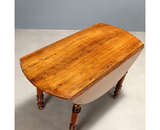 Mid-19th century French table with walnut drop leaves