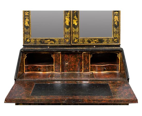 Two-part trumeau in lacquered, gilded, and painted wood. Venice, first half of the 18th century.