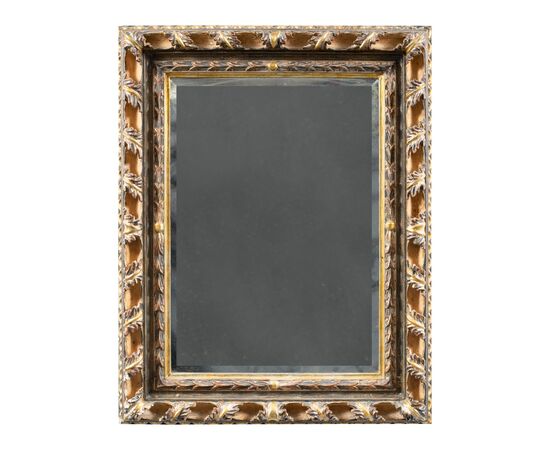 Liberty mirror in carved and gilded wood. Italy, 20th century.