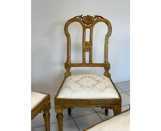 Group of four Louis XVI lacquered and gilded chairs. 18th century. Restored.
