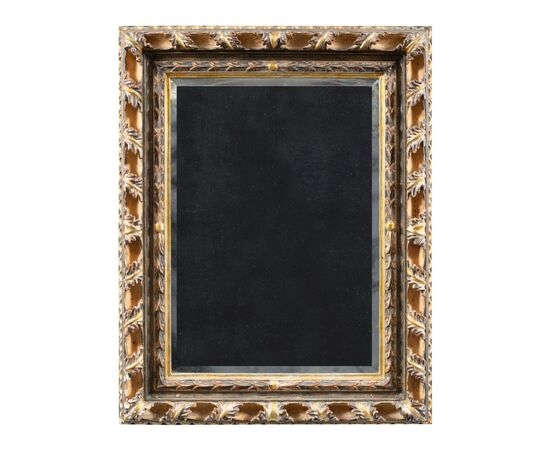 Liberty mirror in carved and gilded wood. Italy, 20th century.