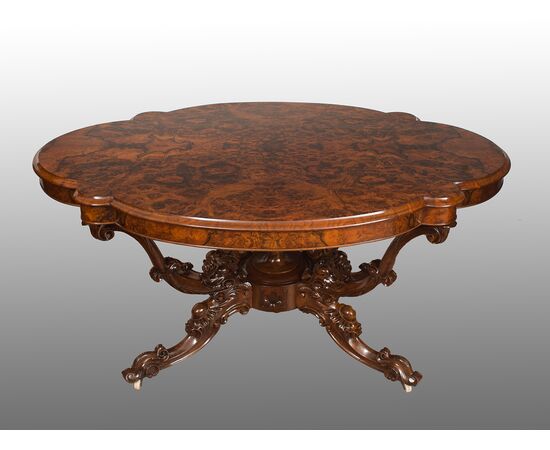 Antique English Victorian table in briar walnut with basket foot. Period 19th century.     