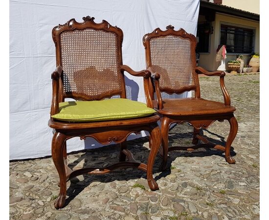Four carved wooden armchairs. Lombardy, mid-18th century.