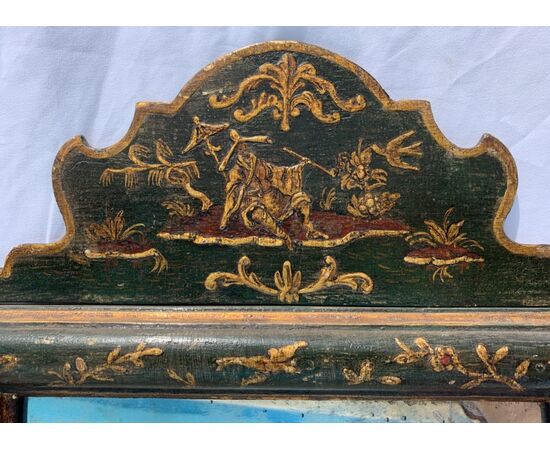 Lacquered, gilded, and painted wooden mirror. Venice, 18th-19th century.