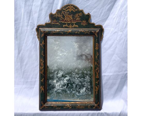 Lacquered, gilded, and painted wooden mirror. Venice, 18th-19th century.
