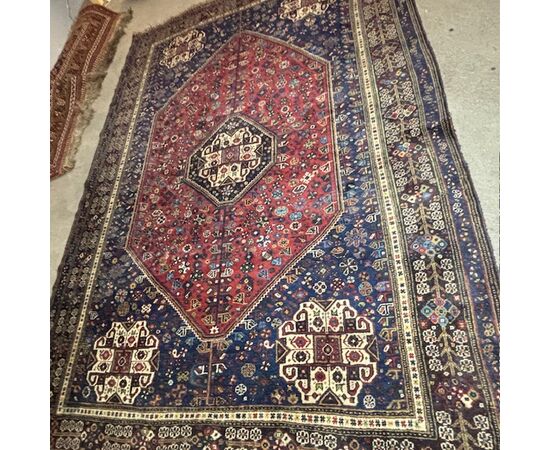 Antique Persian Ashfar rug 1930. Measures 266 x 180. In shades of red and blue.