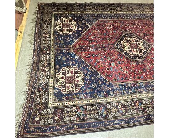 Antique Persian Ashfar rug 1930. Measures 266 x 180. In shades of red and blue.