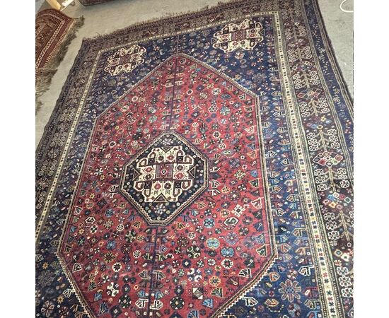 Antique Persian Ashfar rug 1930. Measures 266 x 180. In shades of red and blue.
