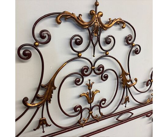 Elegant antique wrought iron double bed headboard. Gold and purple, circa 1930. Dimensions: cm180 . h 155