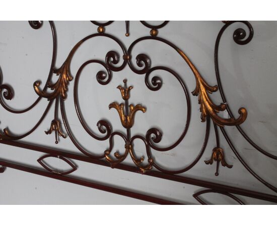 Elegant antique wrought iron double bed headboard. Gold and purple, circa 1930. Dimensions: cm180 . h 155